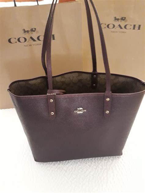 bolsa coach morada original precio|bolsas coach para hombre.